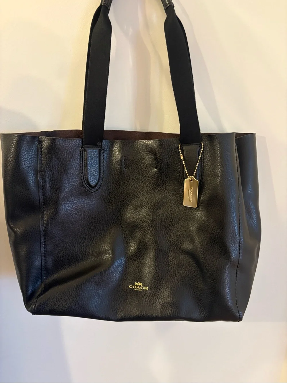 Coach Black Leather Tote with Gold Tag Accent